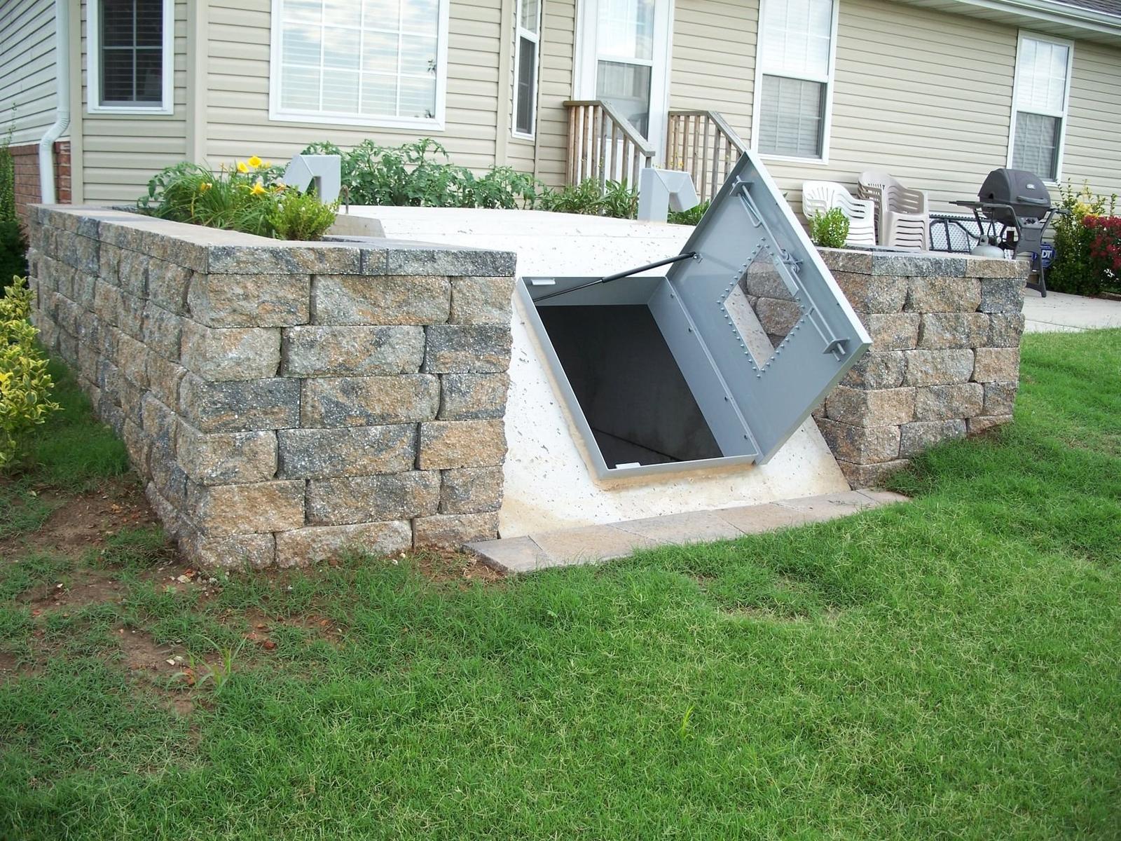 Underground storm shelter open hatch installed backyard DFW Texas